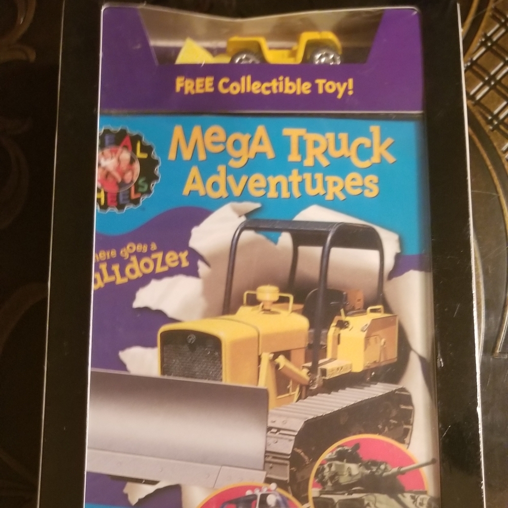 DVD SEALED Collectable Mega Truck Adventures 2004 with collector dozer.